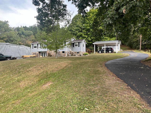 exterior space featuring a carport and a front lawn