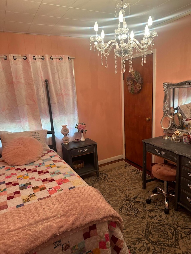 bedroom with a chandelier