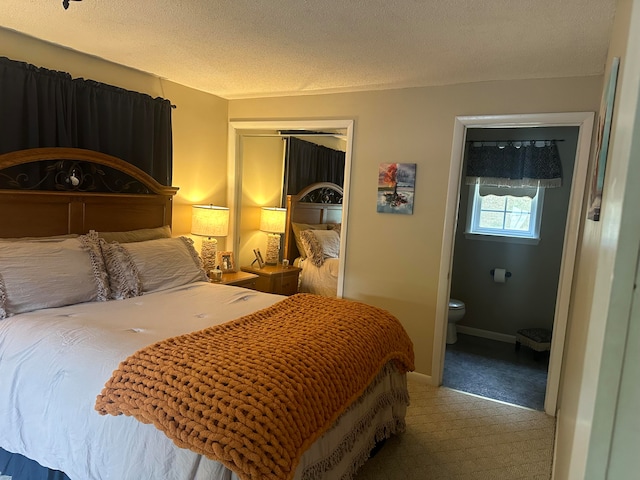 bedroom featuring carpet, a textured ceiling, and a closet