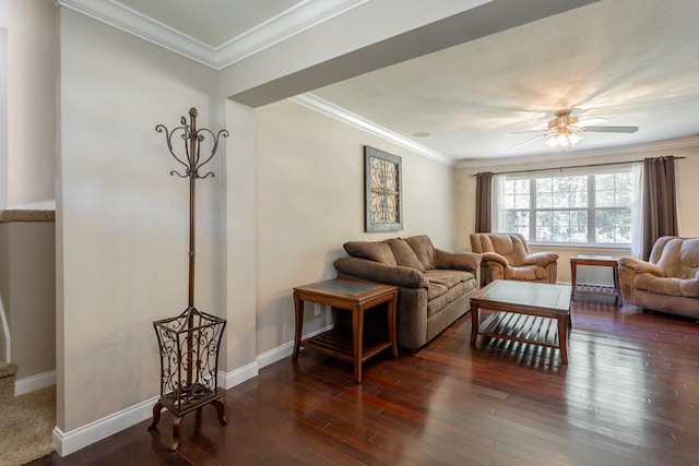 living room with dark wood-type flooring, ceiling fan, and ornamental molding