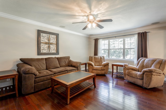 living room with ornamental molding, ceiling fan, dark hardwood / wood-style floors, and a textured ceiling