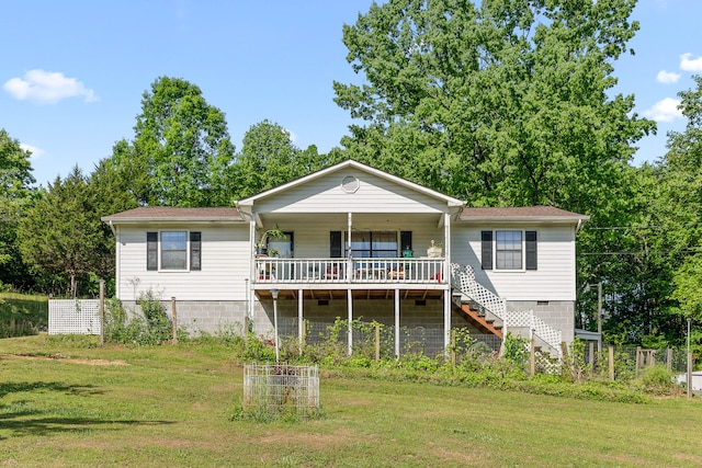 6922 Igou Ferry Rd, Harrison, TN 37341 - view of front of home with a porch, a front yard, and stairway