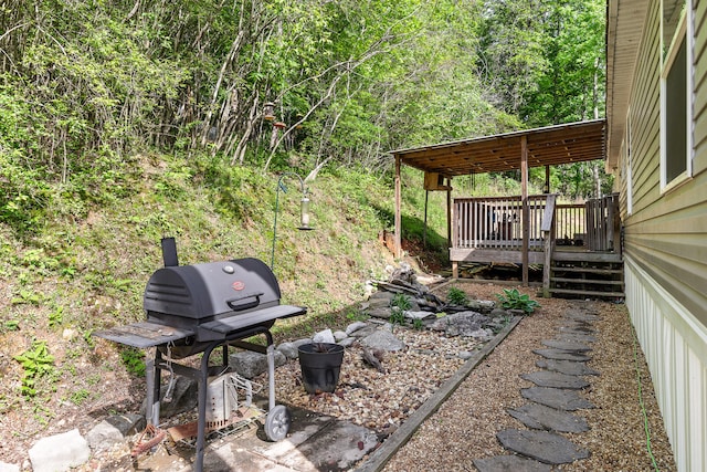 view of yard with a wooden deck