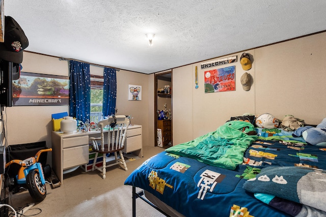 carpeted bedroom with a textured ceiling