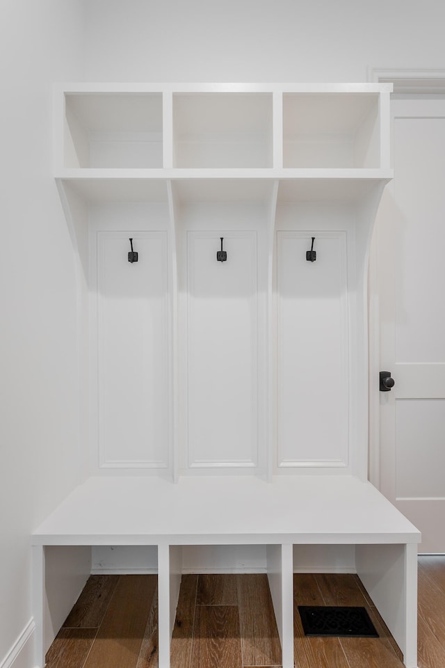 mudroom with dark hardwood / wood-style flooring