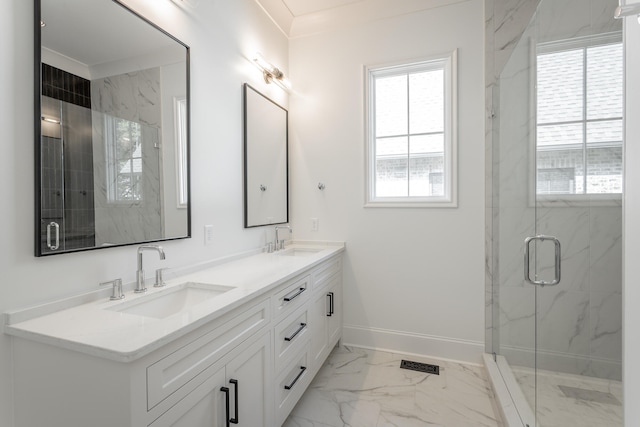 bathroom with walk in shower, crown molding, and vanity