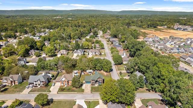 birds eye view of property with a mountain view