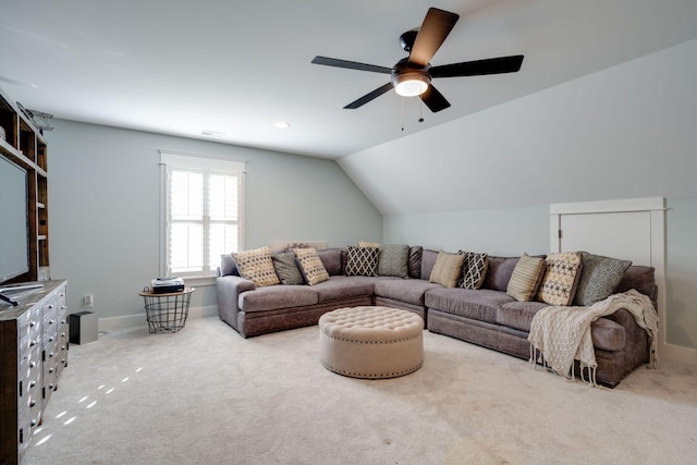 carpeted living room featuring lofted ceiling and ceiling fan