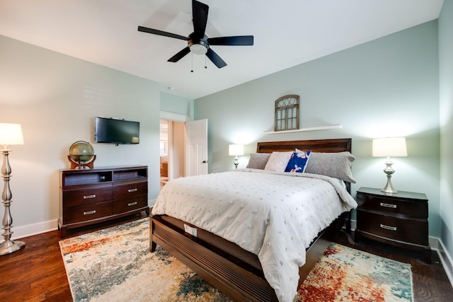 bedroom featuring ceiling fan and dark wood-type flooring