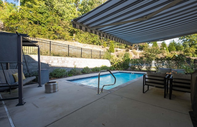 view of pool with a patio