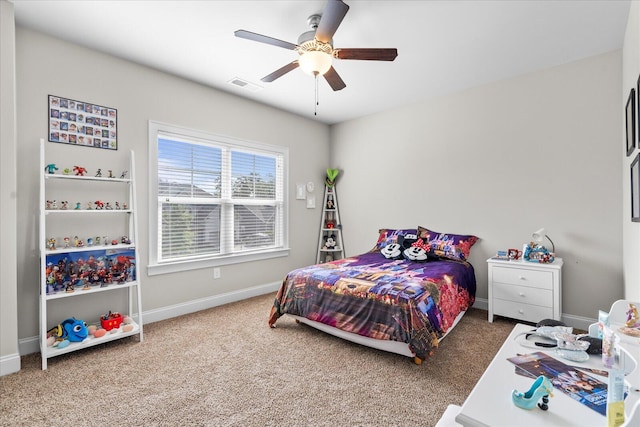 bedroom with ceiling fan and carpet floors