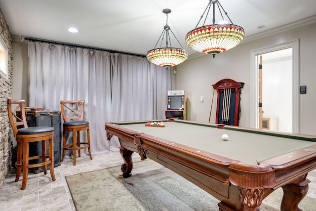 playroom with pool table and crown molding