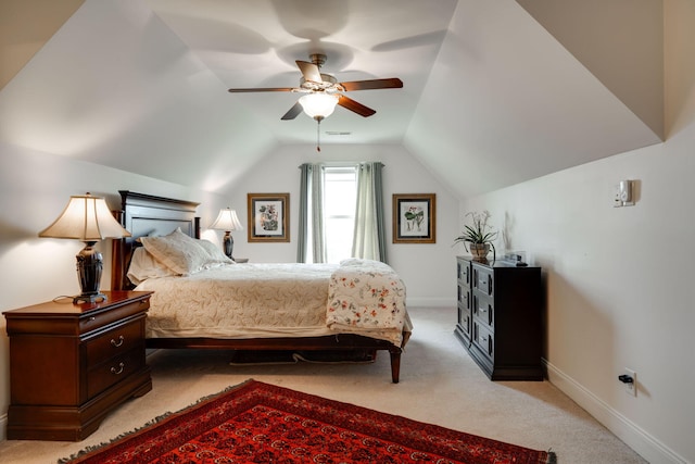 carpeted bedroom with lofted ceiling and ceiling fan