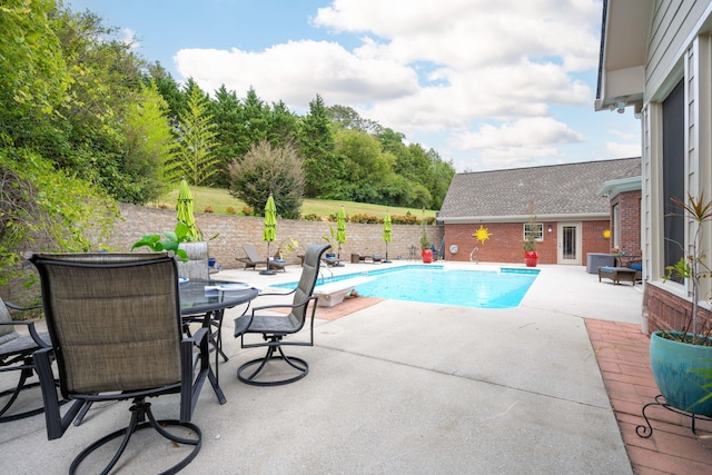 view of pool with a patio