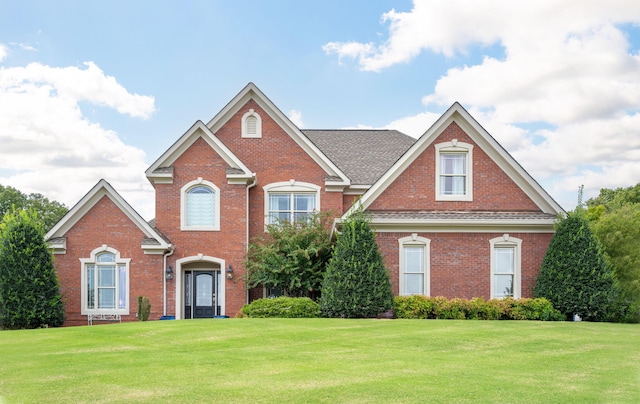 153 Thorncrest Dr, Ringgold, GA 30736 - view of front of home with a front lawn and brick siding
