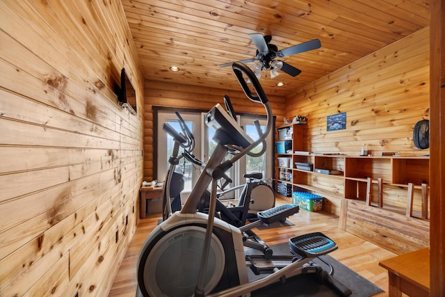 exercise area featuring wood finished floors, recessed lighting, wood ceiling, and ceiling fan