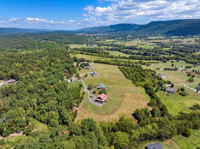 drone / aerial view featuring a rural view and a mountain view