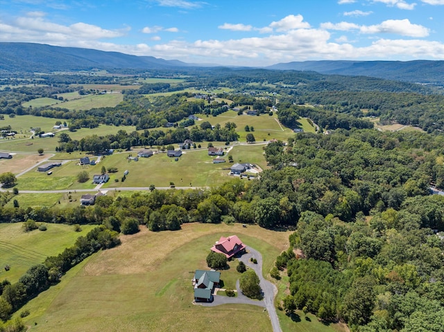 aerial view featuring a rural view and a mountain view