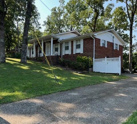 view of front of home with a front yard