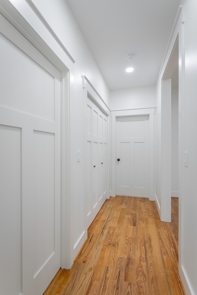 hallway featuring light wood-type flooring