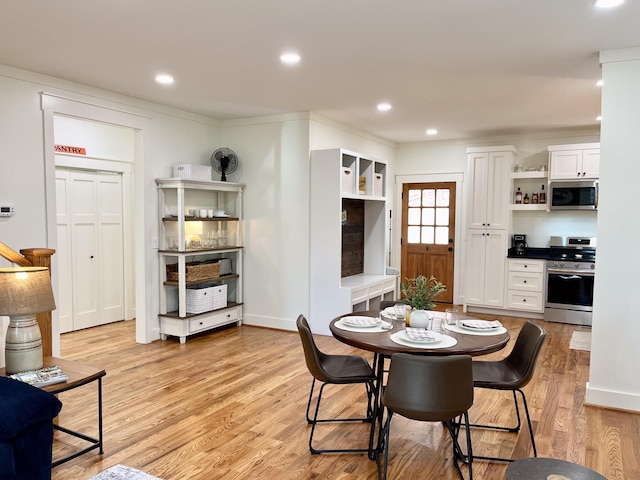 dining room with light hardwood / wood-style floors