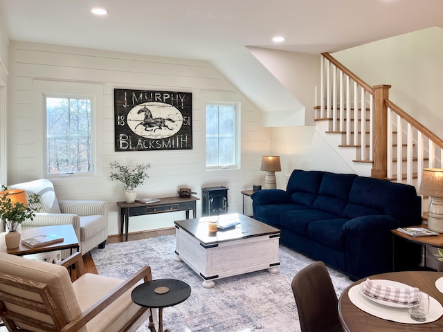 living room with wood walls