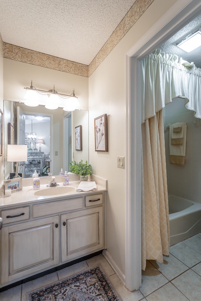 bathroom featuring vanity, independent shower and bath, a textured ceiling, and tile patterned flooring