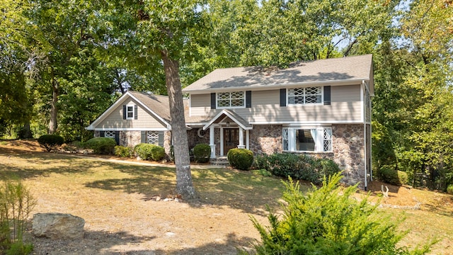 view of front of home featuring a front lawn