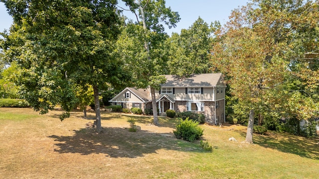 view of front of property with a front lawn