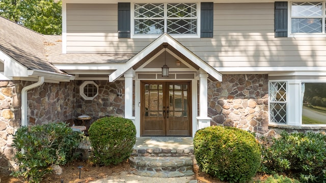 doorway to property featuring french doors