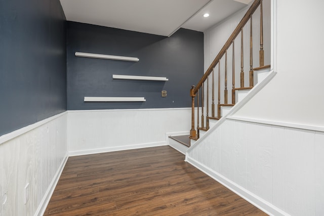 stairs with hardwood / wood-style floors