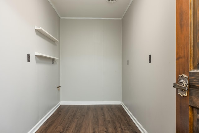 washroom with crown molding and dark hardwood / wood-style floors