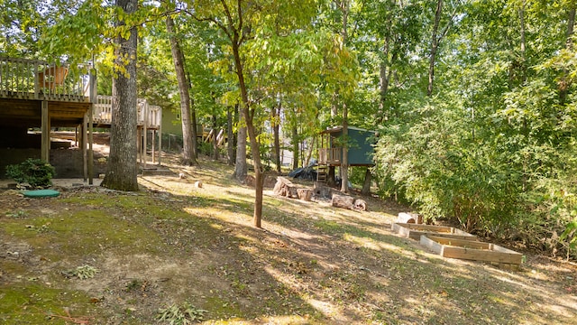 view of yard with a wooden deck