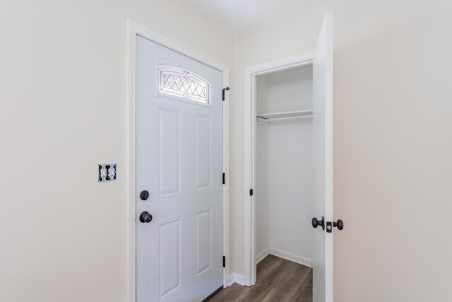 interior space with dark hardwood / wood-style floors