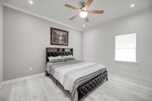 bedroom featuring light wood-type flooring, ceiling fan, and ornamental molding