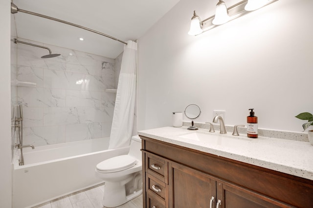 full bathroom with shower / bath combination with curtain, vanity, and toilet