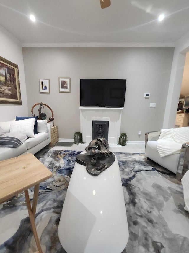 living room with ornamental molding