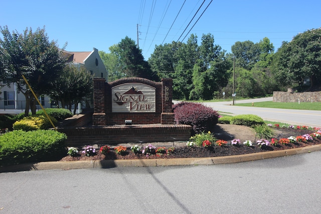 view of community sign