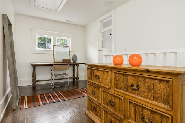 home office with ornamental molding and dark hardwood / wood-style floors