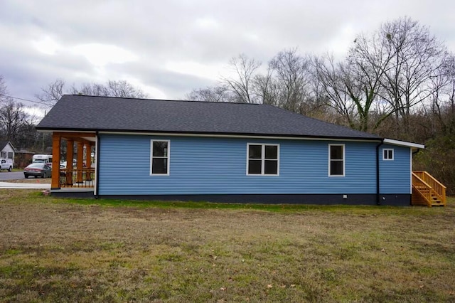 view of property exterior featuring a lawn