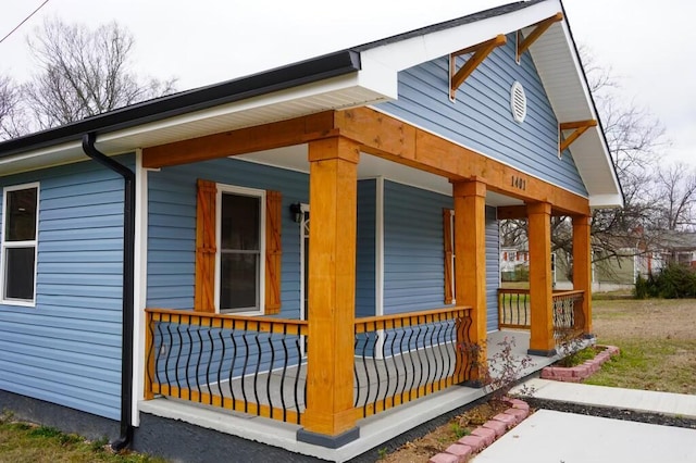 view of home's exterior with covered porch