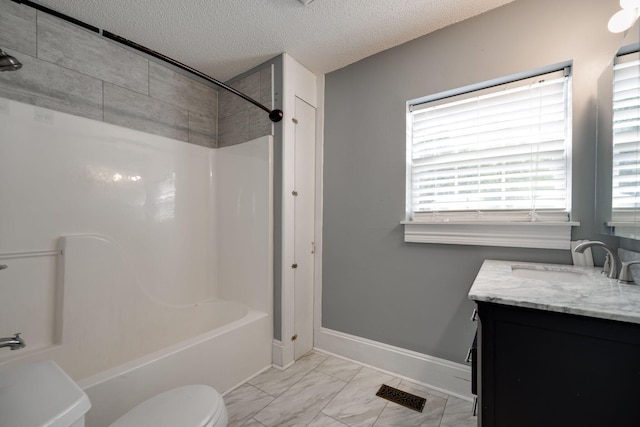 full bathroom featuring shower / tub combination, toilet, a textured ceiling, and vanity