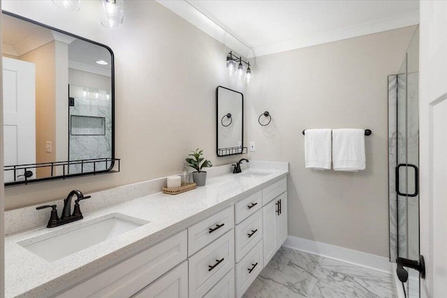 bathroom with crown molding, vanity, and a shower with door