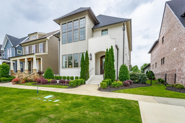 view of front of home featuring a front yard