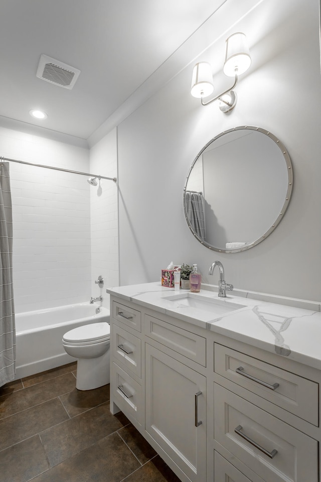 full bathroom featuring tile patterned flooring, vanity, toilet, and shower / bath combo