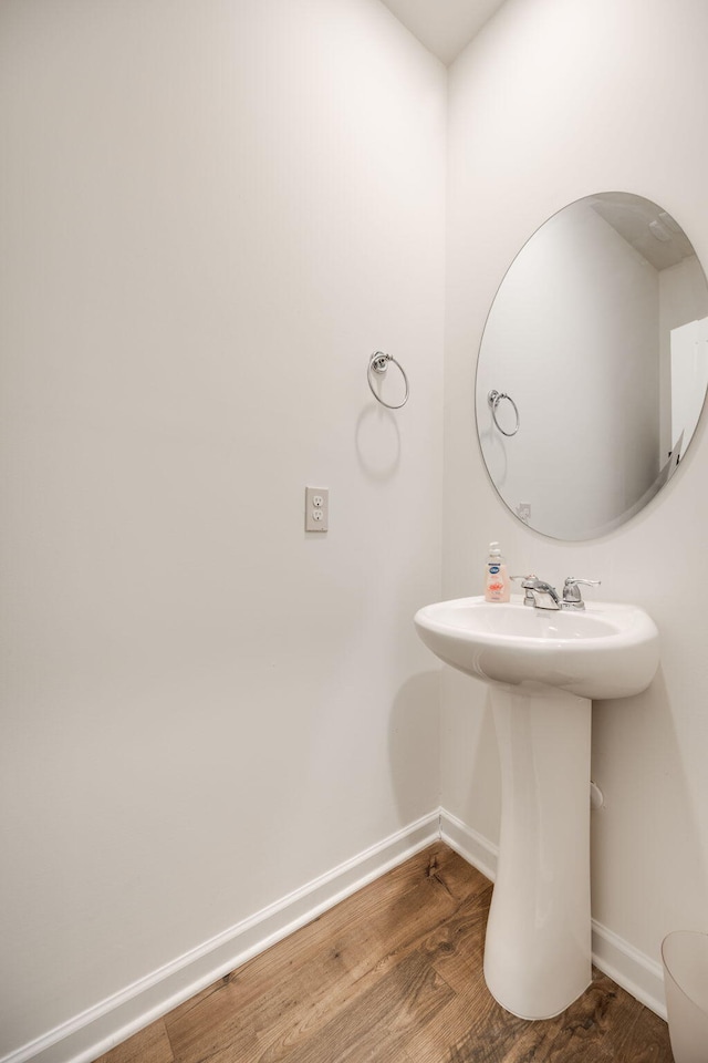 bathroom featuring hardwood / wood-style flooring