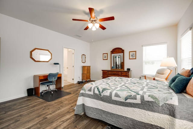 bedroom with ceiling fan and dark hardwood / wood-style floors