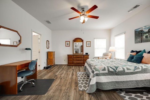 bedroom with ceiling fan and hardwood / wood-style floors