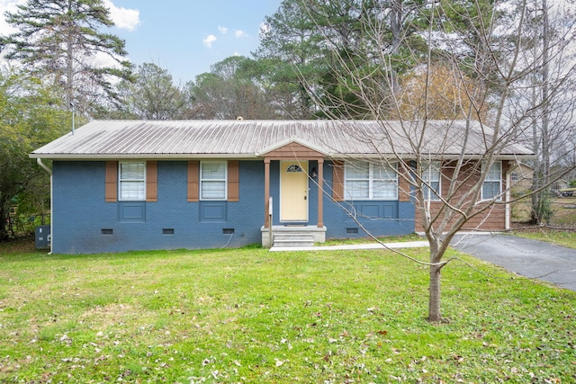 ranch-style house with a front lawn