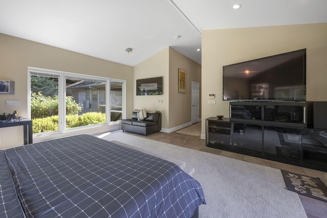 tiled bedroom with lofted ceiling